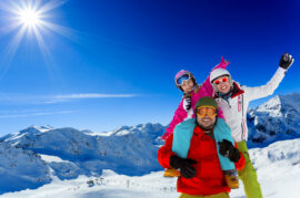 Ski family enjoying winter